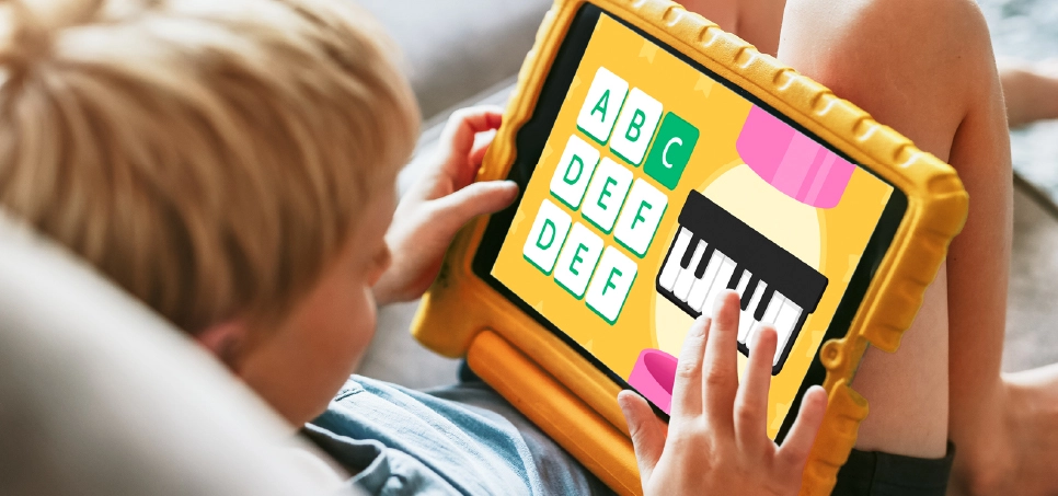 1-apolo-kokoro-kids kid playing educational games with tablet